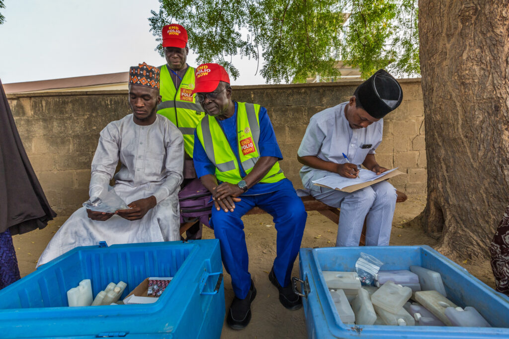 Rotary members inspect how health workers prepare supplies for a door-to-door polio immunization campaign in Maiduguri, Borno State, Nigeria. 30 April 2019. Rotary International is working closely with the government of Nigeria and its GPEI partners to intensify polio-eradication efforts there by addressing cultural barriers, fostering community education, and increasing surveillance.
